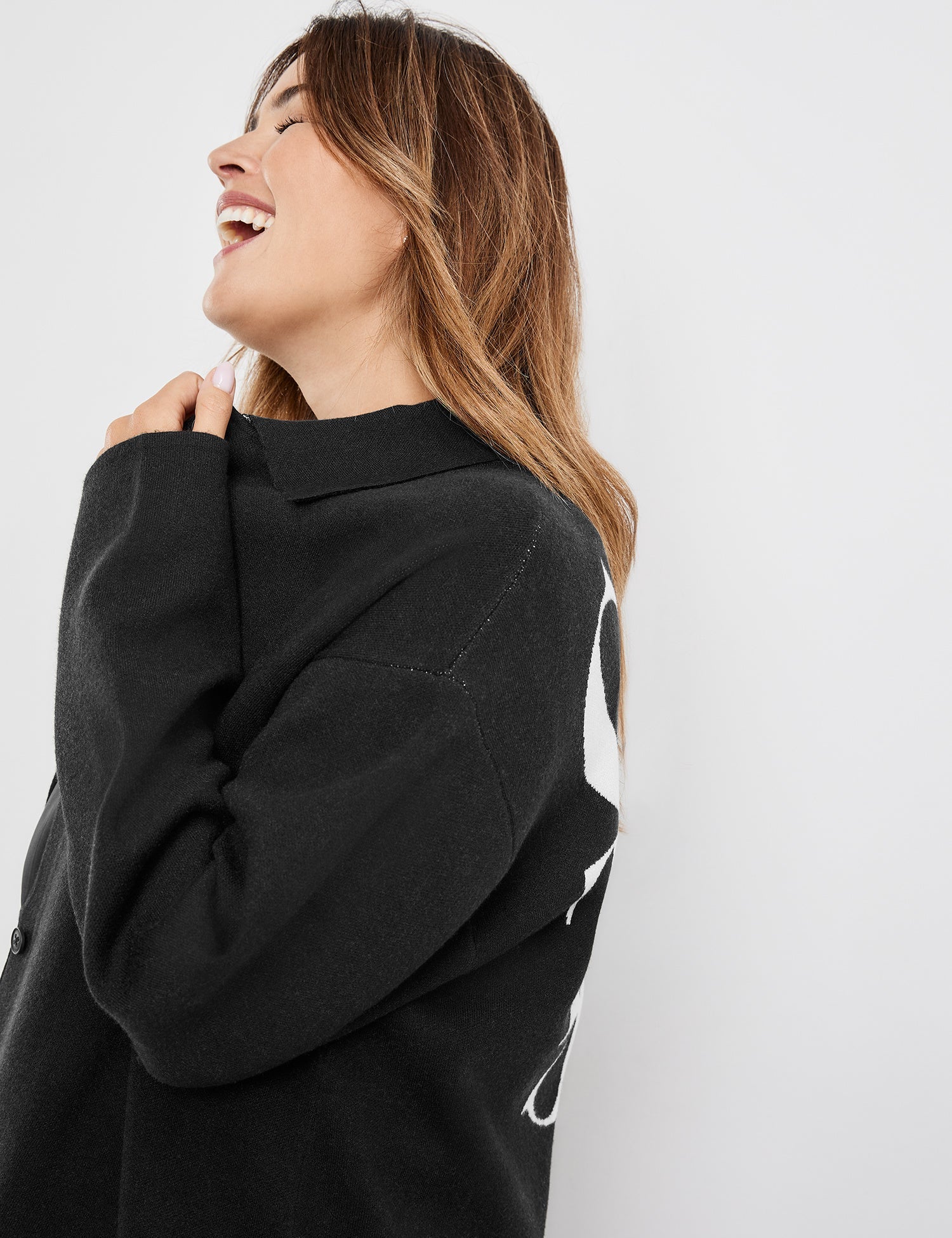 Black Shacket With Text On The Back