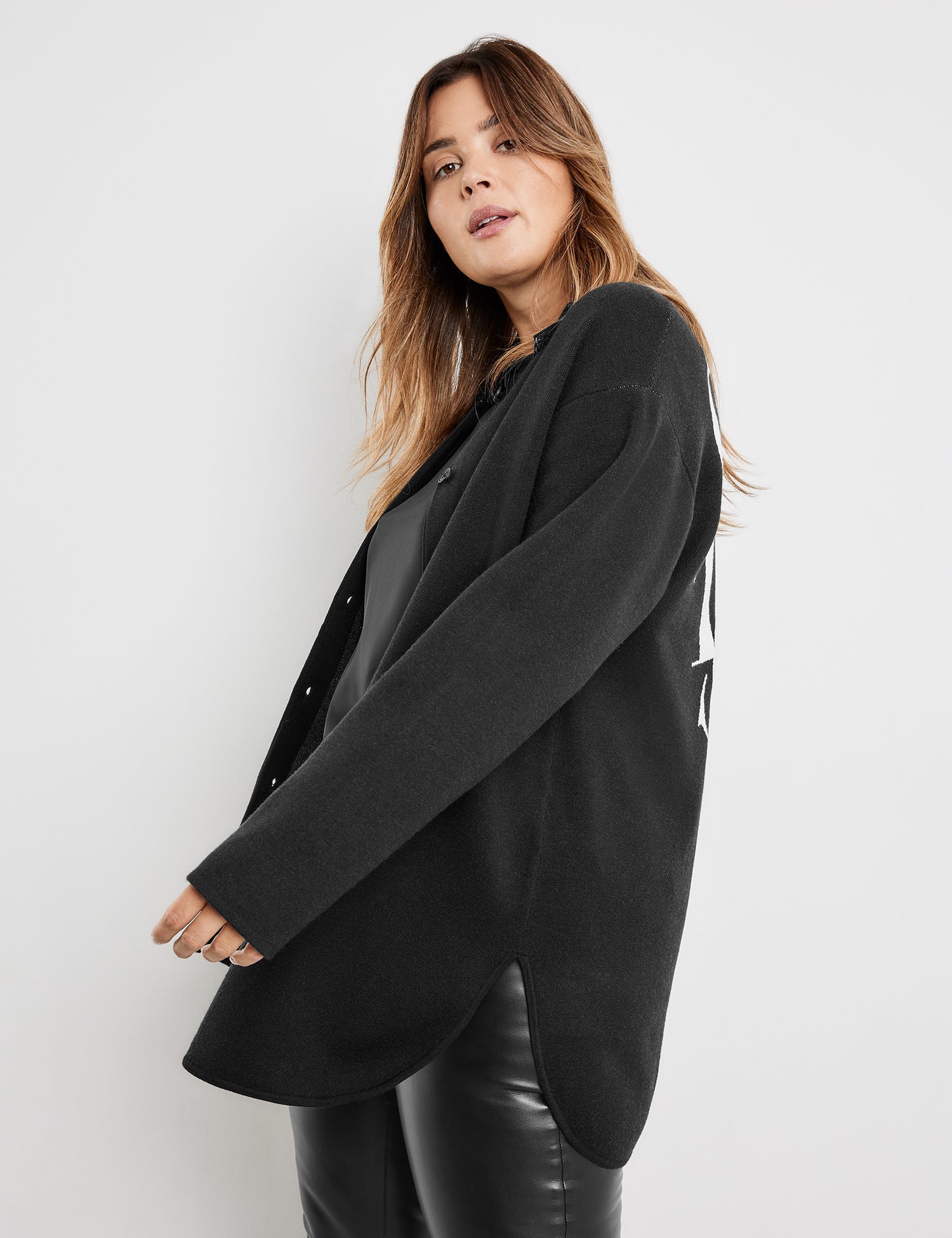 Black Shacket With Text On The Back