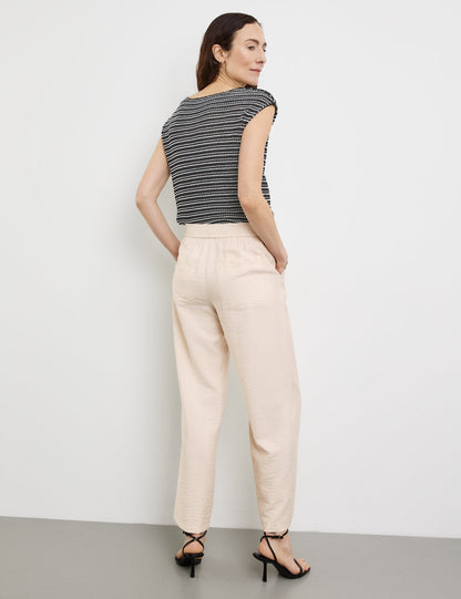 Flowing Trousers With A Stretch Waistband_320047-31354_90138_06