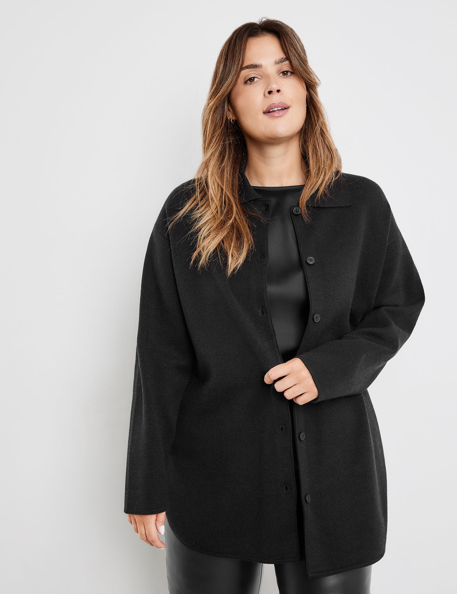 Black Shacket With Text On The Back