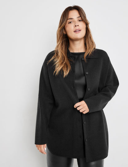 Black Shacket With Text On The Back