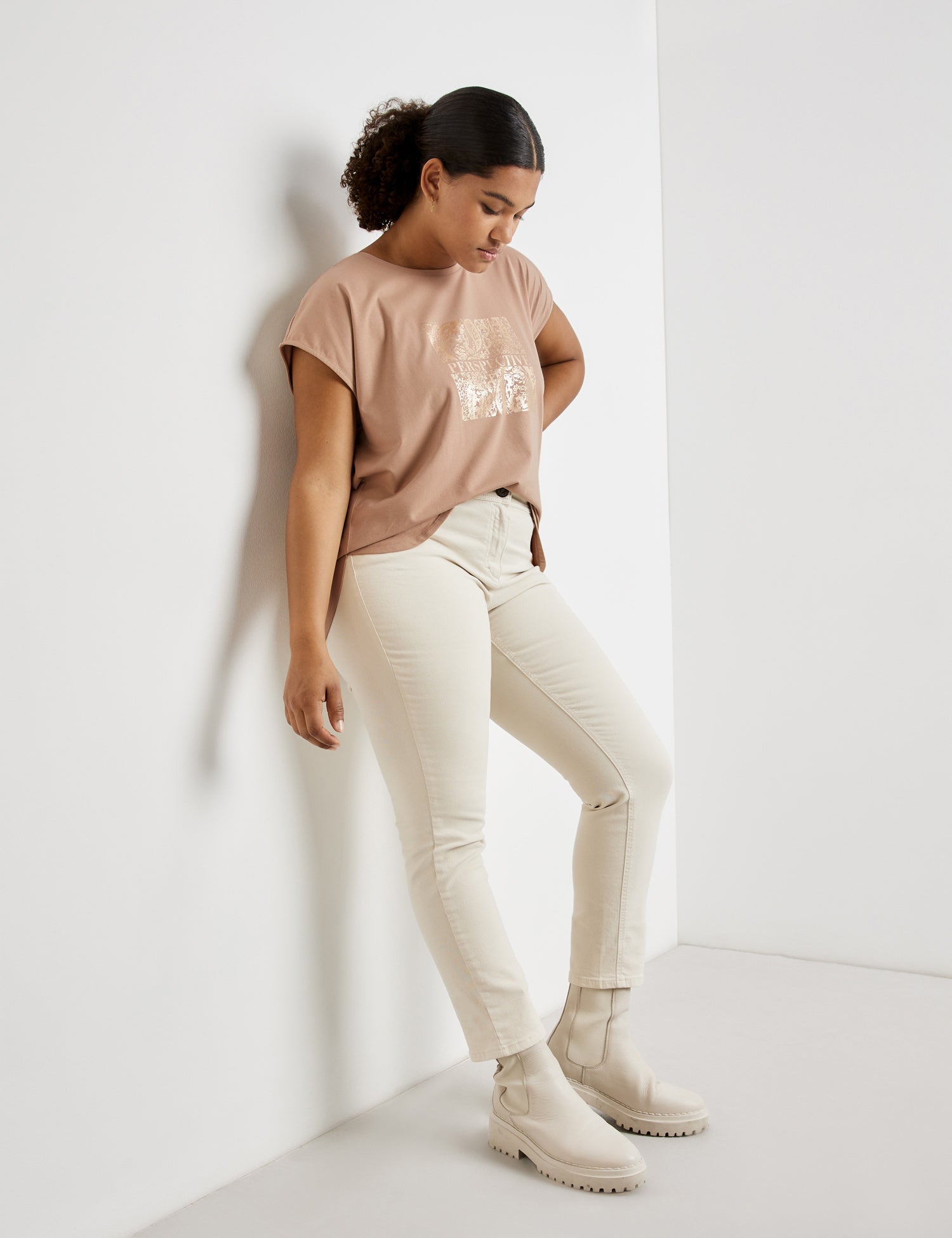 Beige T-Shirt With Metallic Print On The Front