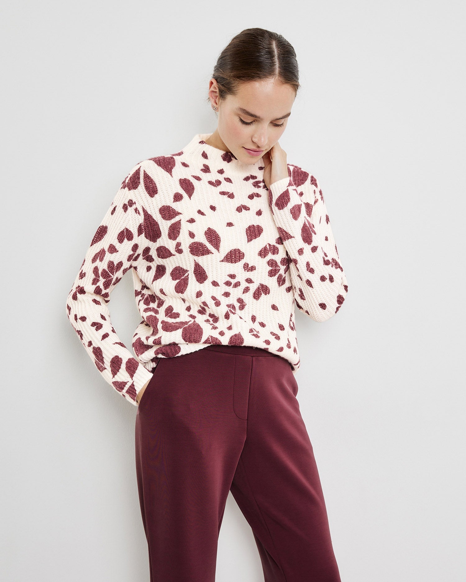 Red Jumper With A Leaf Print