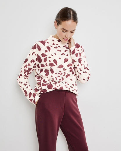 Red Jumper With A Leaf Print