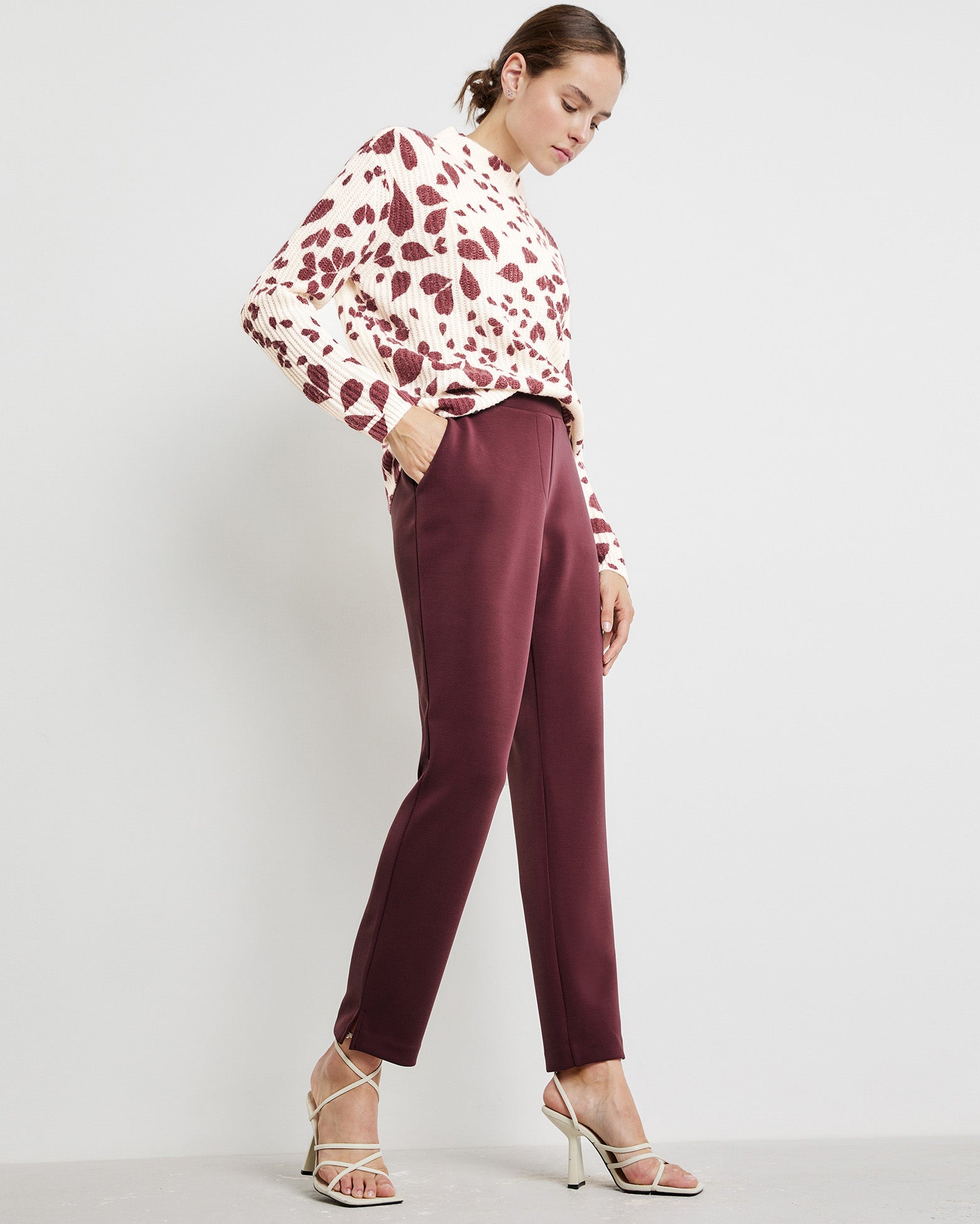 Red Jumper With A Leaf Print