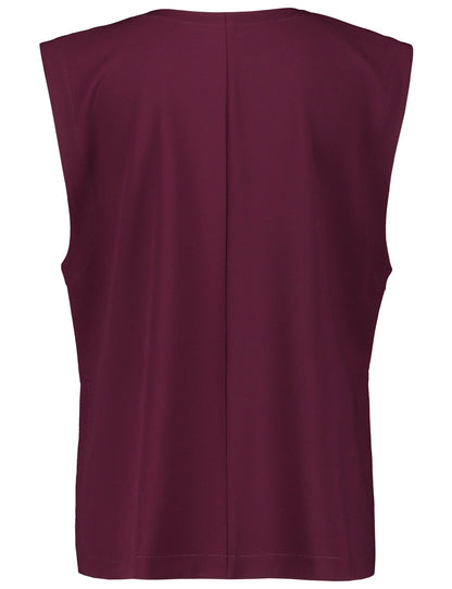 Red Sleeveless Blouse